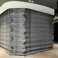 Deployed grey fire curtains in transit hub