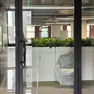 Double door and panel in fire rated wall