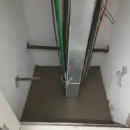 Cable shaft sealed using fire stop mortar