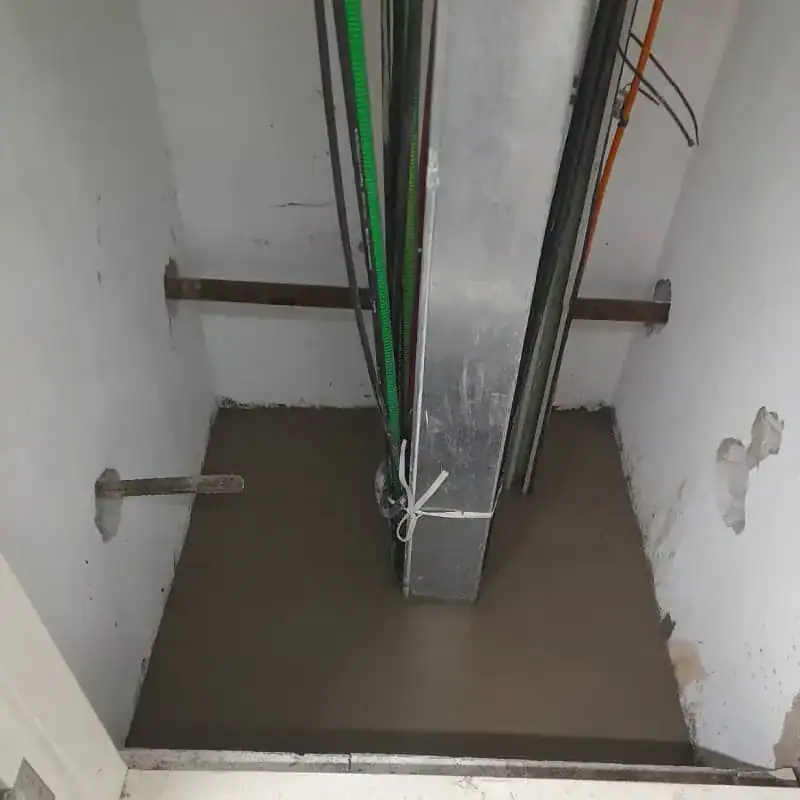 Cable shaft sealed using fire stop mortar