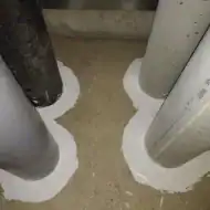 Floor pipes in passive fire protection system