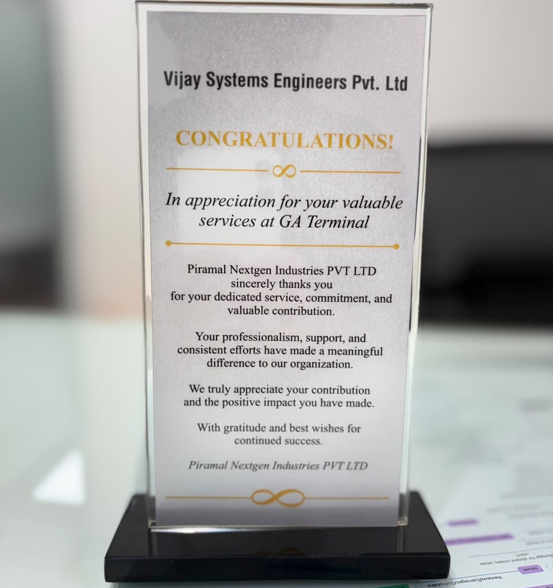 Appreciation award presented to Vijay Systems Engineers by Piramal NextGen Industries for services at GA Terminal.