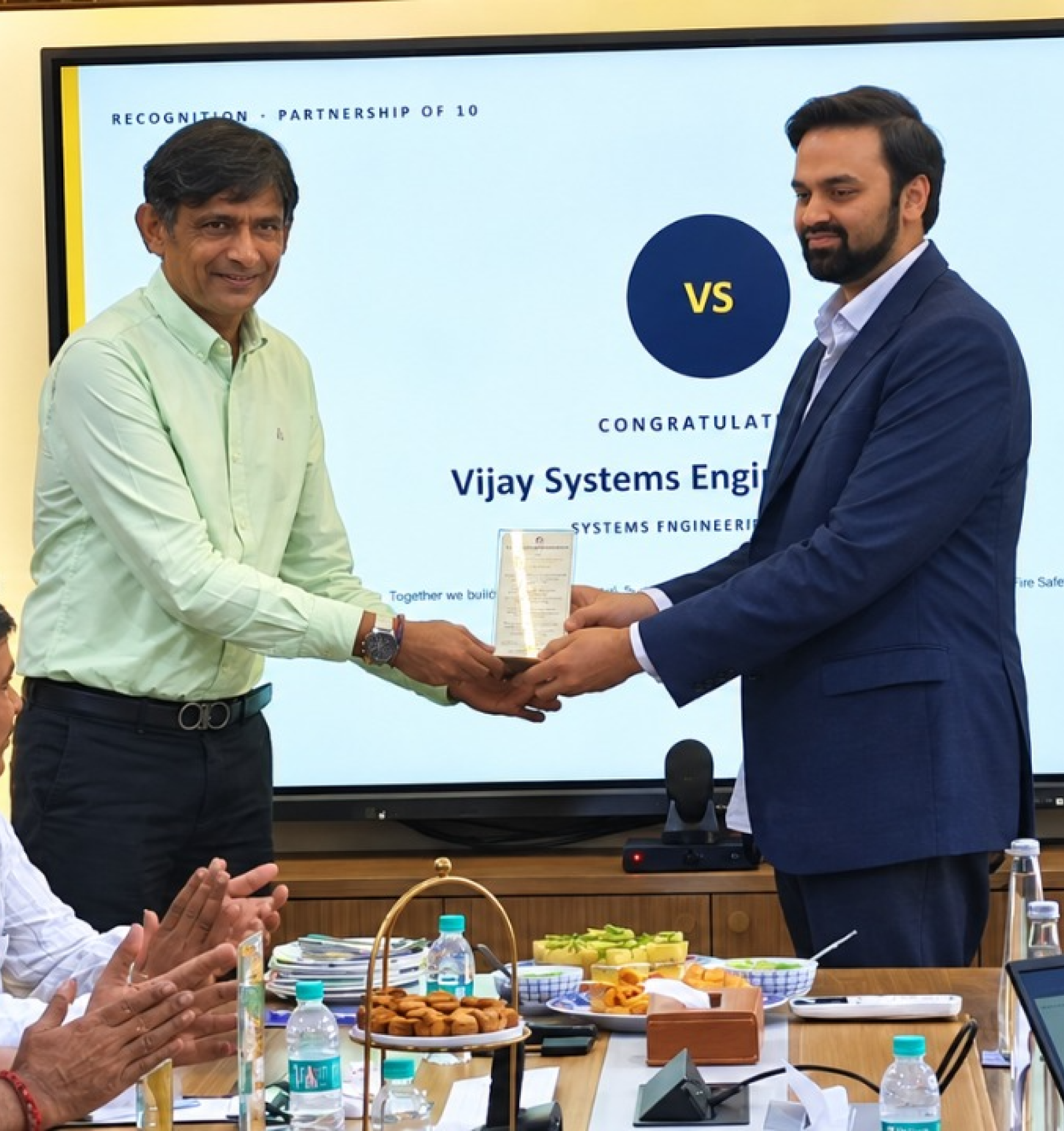 Vijay Systems Engineers receiving recognition for their contribution to the GA Terminal project.